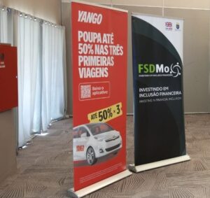 Two roll up banners showcasing Yango's transformative impact in Mozambique.